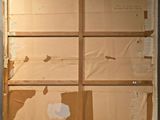 a picture of a piece of cardboard that has been torn off