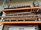 a lot of pallets stacked on top of each other in a warehouse