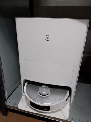 an image of a toilet in a small room