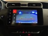 a picture of a car ' s rear view camera in the dash