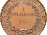 an image of a medal with a wreath on it