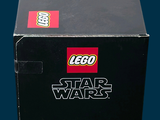 a box with a lego star wars figure inside of it