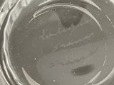 a close up of a glass bowl with a label on it