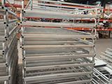 a large amount of metal shelves in a warehouse