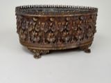 a large metal bowl with spikes on it