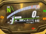 a close up of a speedometer on a motorcycle