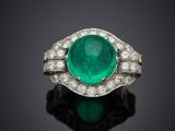 an emerald and diamond ring