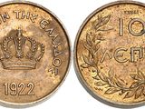 a close up of a coin with a crown on it