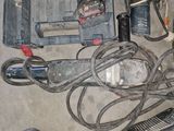a lot of tools that are laying out on the floor