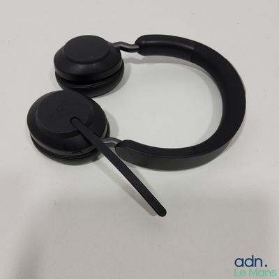 a pair of headphones sitting on top of a white table