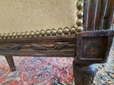 a close up of a chair on a rug on the floor