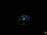 an image of a black ball in the dark