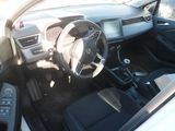 a picture of a car with a steering wheel and dashboard