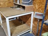 a work bench with a scale on it in a room