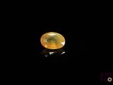 a yellow diamond in the dark