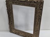 an old picture frame with a white background and a white background