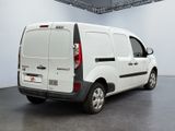 a white van that is parked in a room