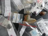 a lot of small bags of food that are on the table