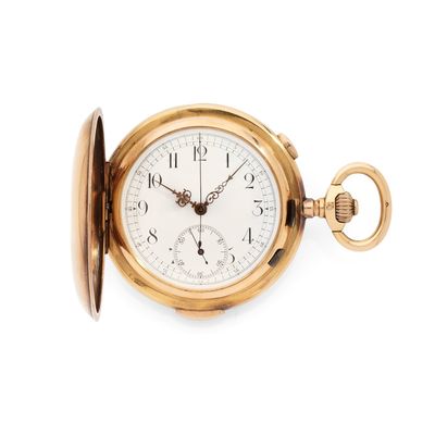 une vieille montre de poche en or avec un cadran blanc sur fond blanc