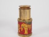 an image of a gold and red container with a elephant on it