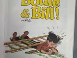 the book is opened to show a picture of a boy laying on the ground