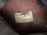 a piece of paper that has been left on a piece of leather