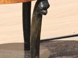 a small table with a wooden top and a metal base