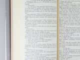 an open book that is sitting on a table