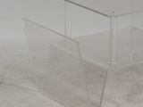 an image of a clear plastic table with a shelf