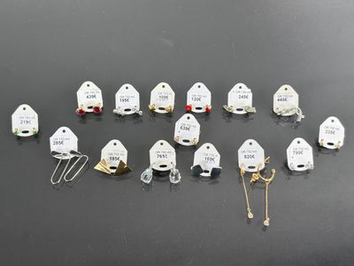 a lot of small white ghost figurines on a table