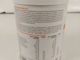 a container of yogurt sitting on a table