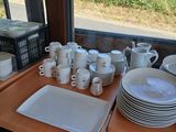a table with a lot of plates and cups on it