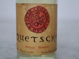 a bottle of wine that is sitting on a table