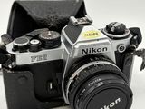 a small camera with a lens attached to it
