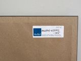 a box with a sticker on it sitting on a table