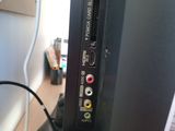 a close up view of a computer monitor with wires attached to it