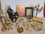 a table with a lot of antique items on it