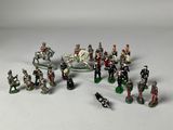 a lot of figurines that are sitting on a table