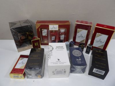 a lot of different types of perfumes on the table