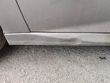 a close up of a car with a flat tire