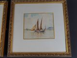 pair of framed watercolor paintings of sailboats on the water