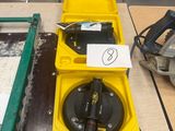 two yellow boxes that are sitting on a table