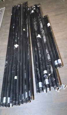 a lot of pipes that are sitting on the floor