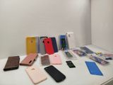many cell phones that are sitting on a table