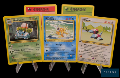 four pokemon cards are displayed on a black background
