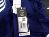 a close up of a blue shirt with a price tag on it
