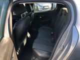 the back seat of a car with the back door open