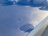 a reflection of a car in the side mirror of a car