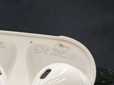 a pair of airpods sitting in a box on a table
