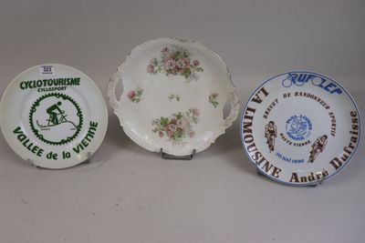 three plates with different designs on them sitting on a table